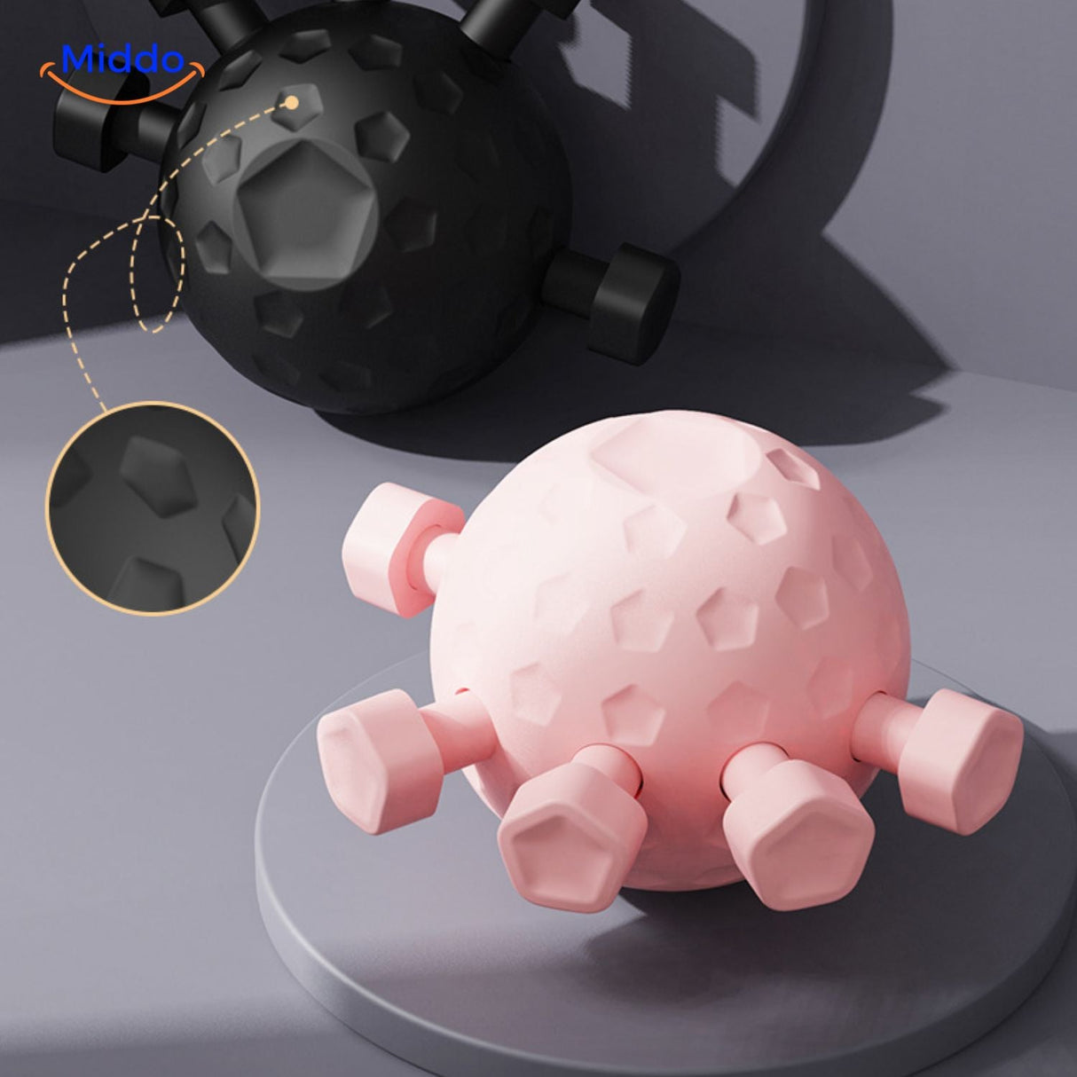 balle de massage mains en coloris noir et rose au design durable
