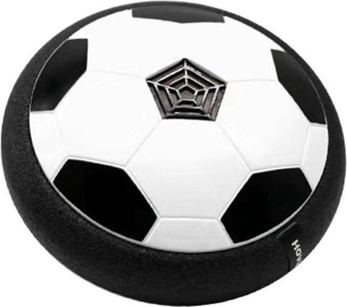 ballon de football flottant en forme de disque noir et blanc qui vole au-dessus du sol sur fond blanc