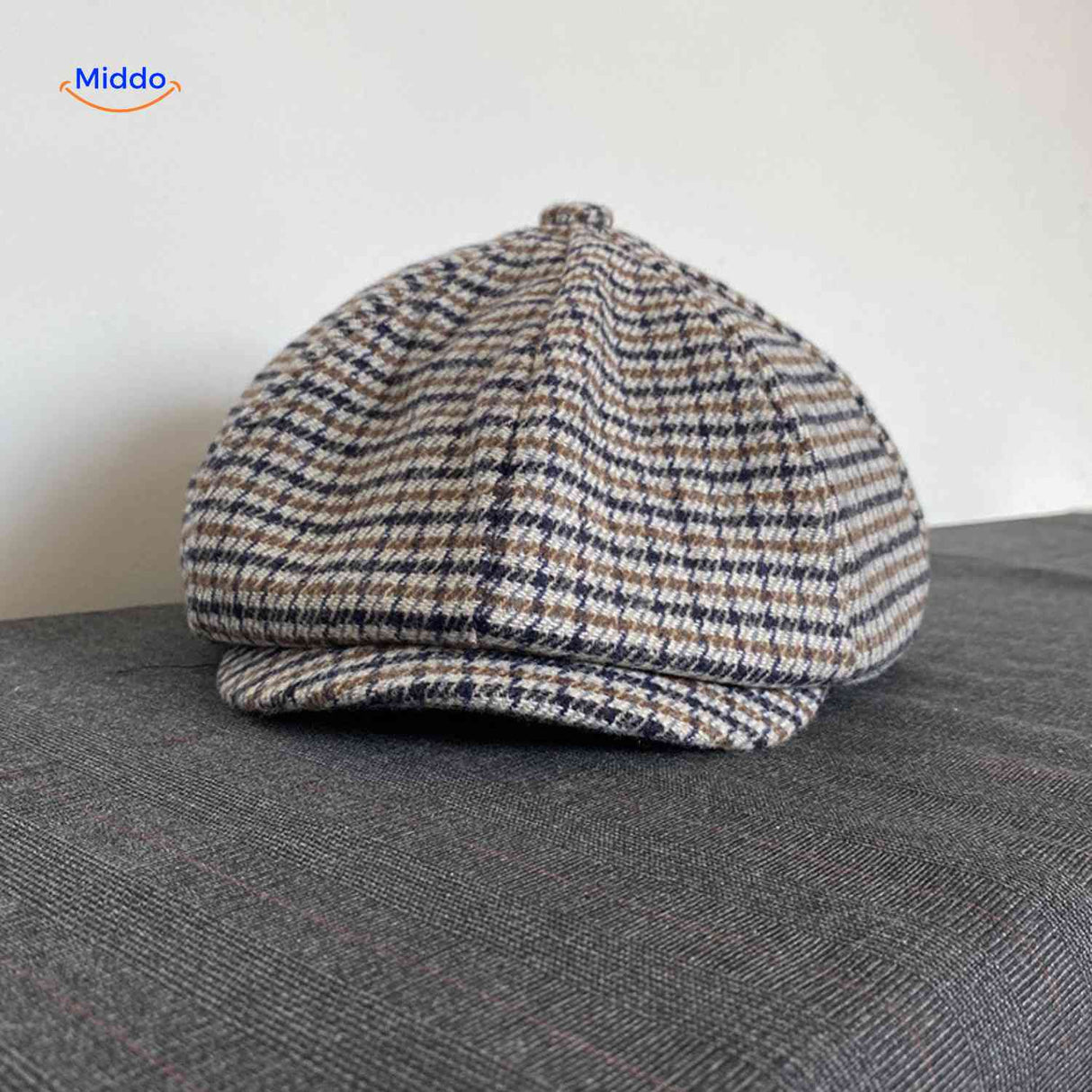 casquette plate bleu et marron motif pied-de-poule en laine