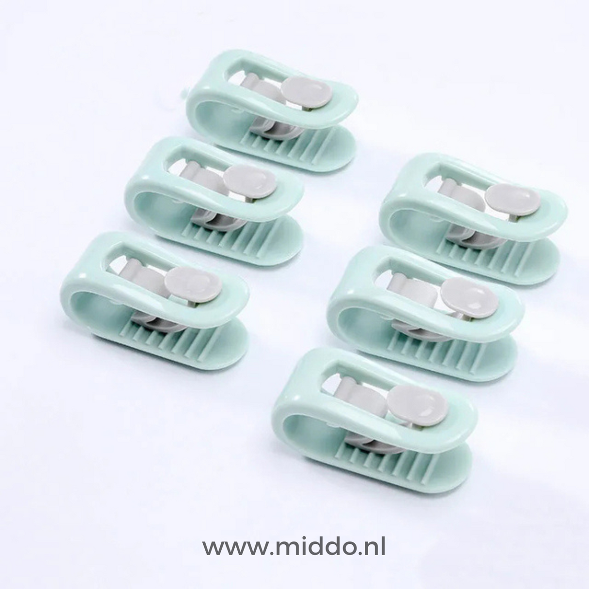 six clips anti-glissement pour couette coloris vert sur fond blanc