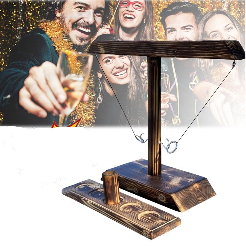 jeu de lancer d'anneaux en bois lors d'une fête animée en intérieur