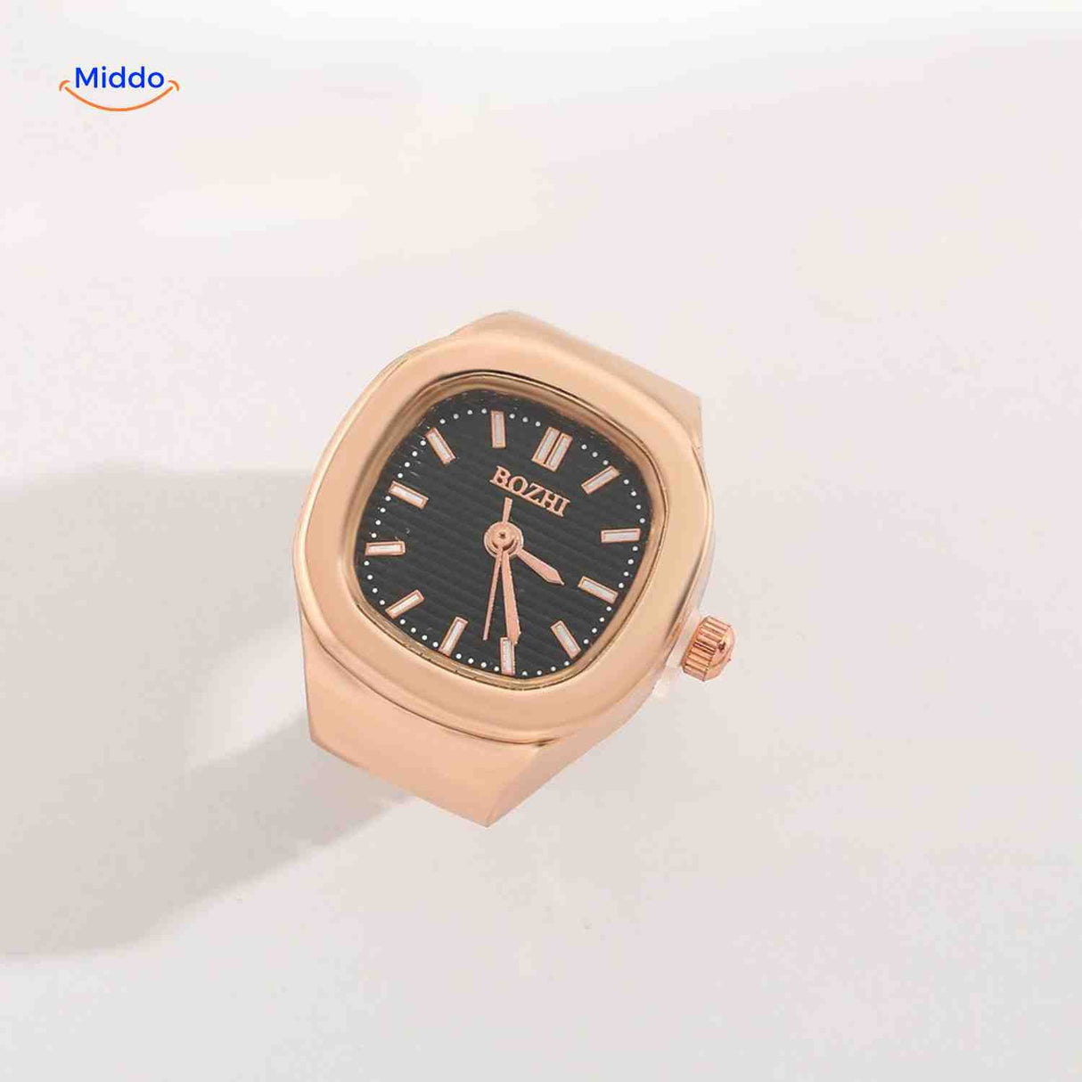montre-bague or rose avec cadran noir, look luxueux et moderne
