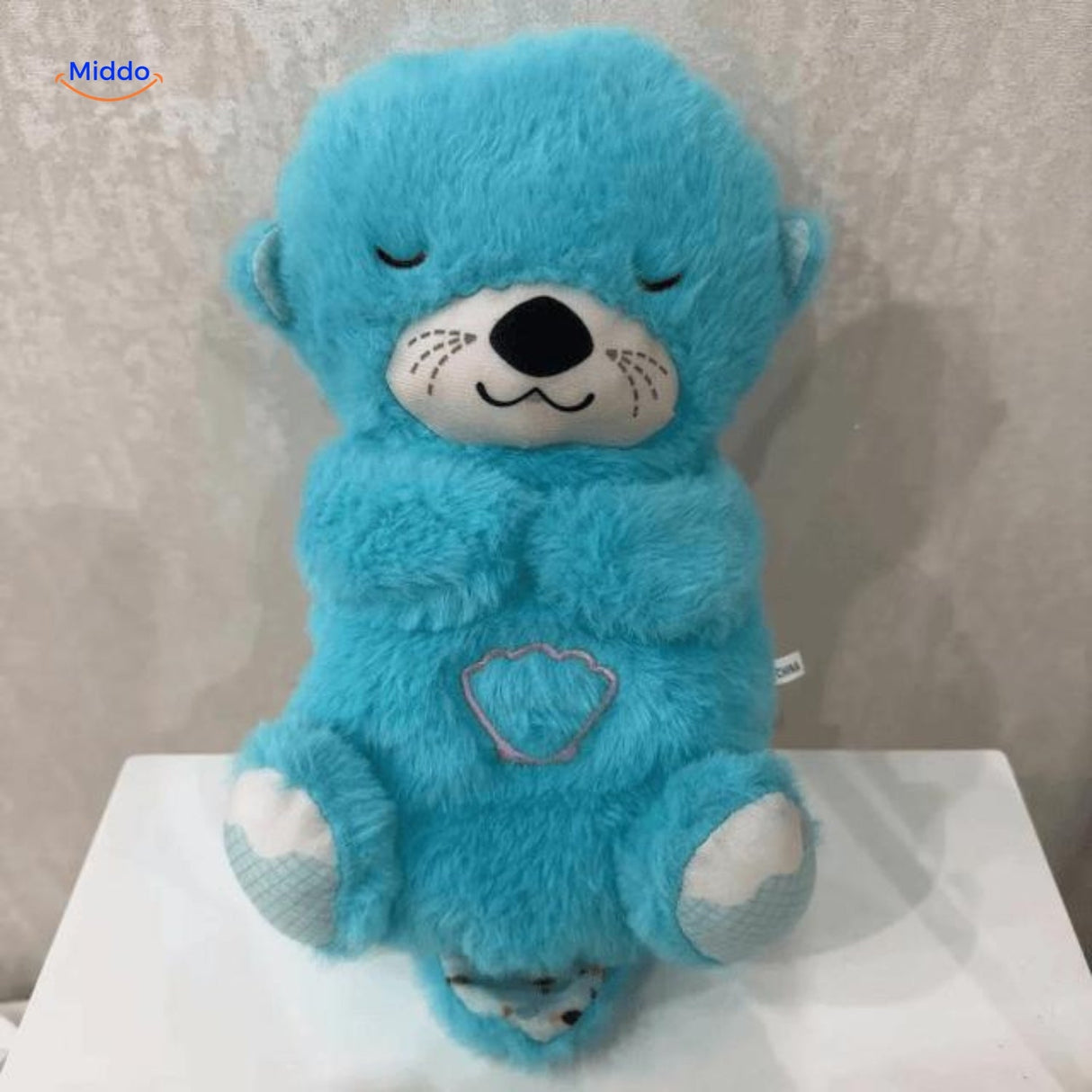 cuddlebuddy peluche apaisante bleue pour bébé, compagnon doux pour des nuits calmes et reposantes