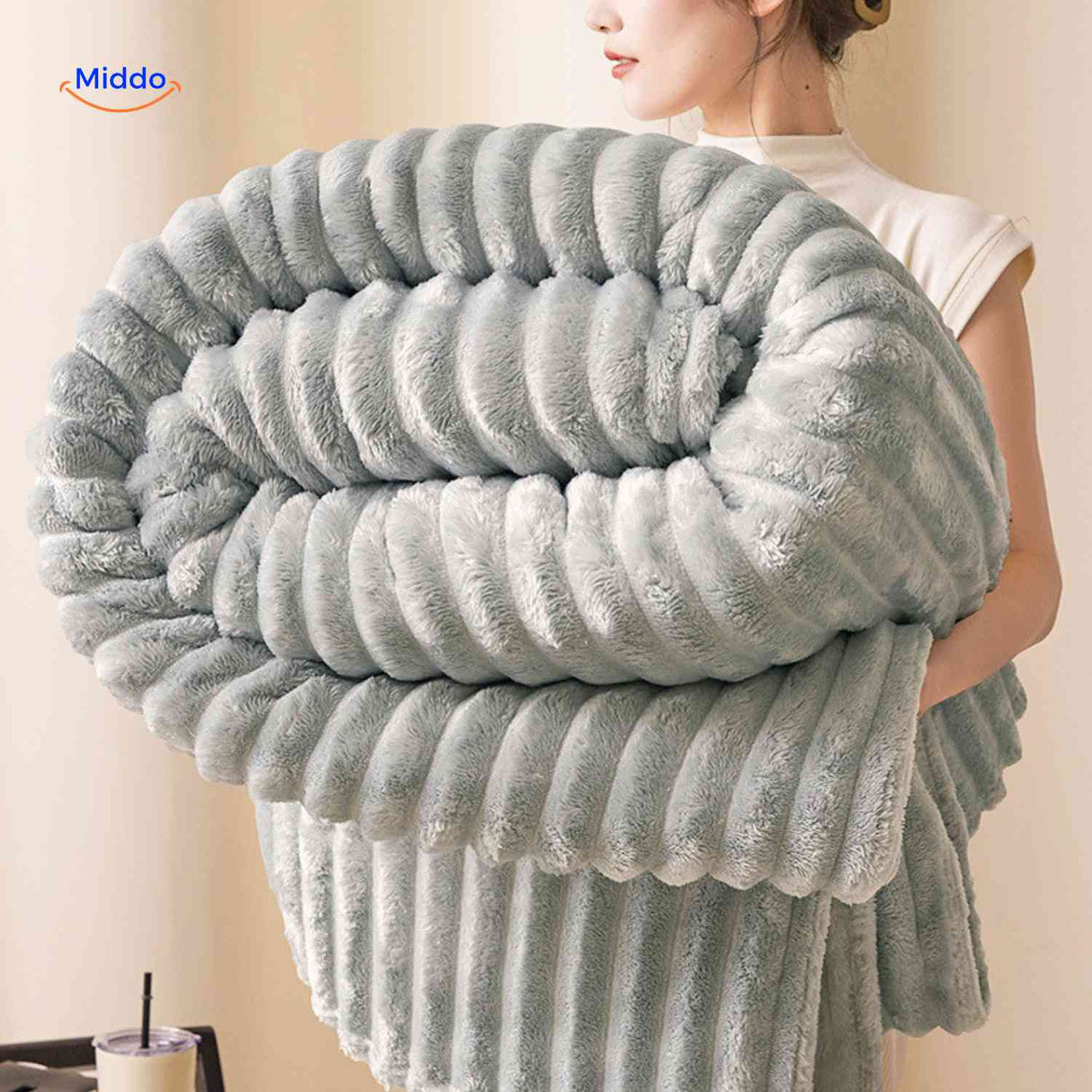 plaid en peluche moelleux et doux, texture laineuse agréable au toucher