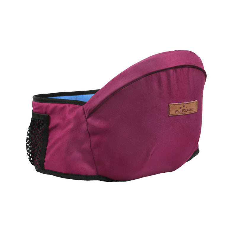 porte-bébé ergonomique rose foncé avec poche en filet aéré sur fond blanc