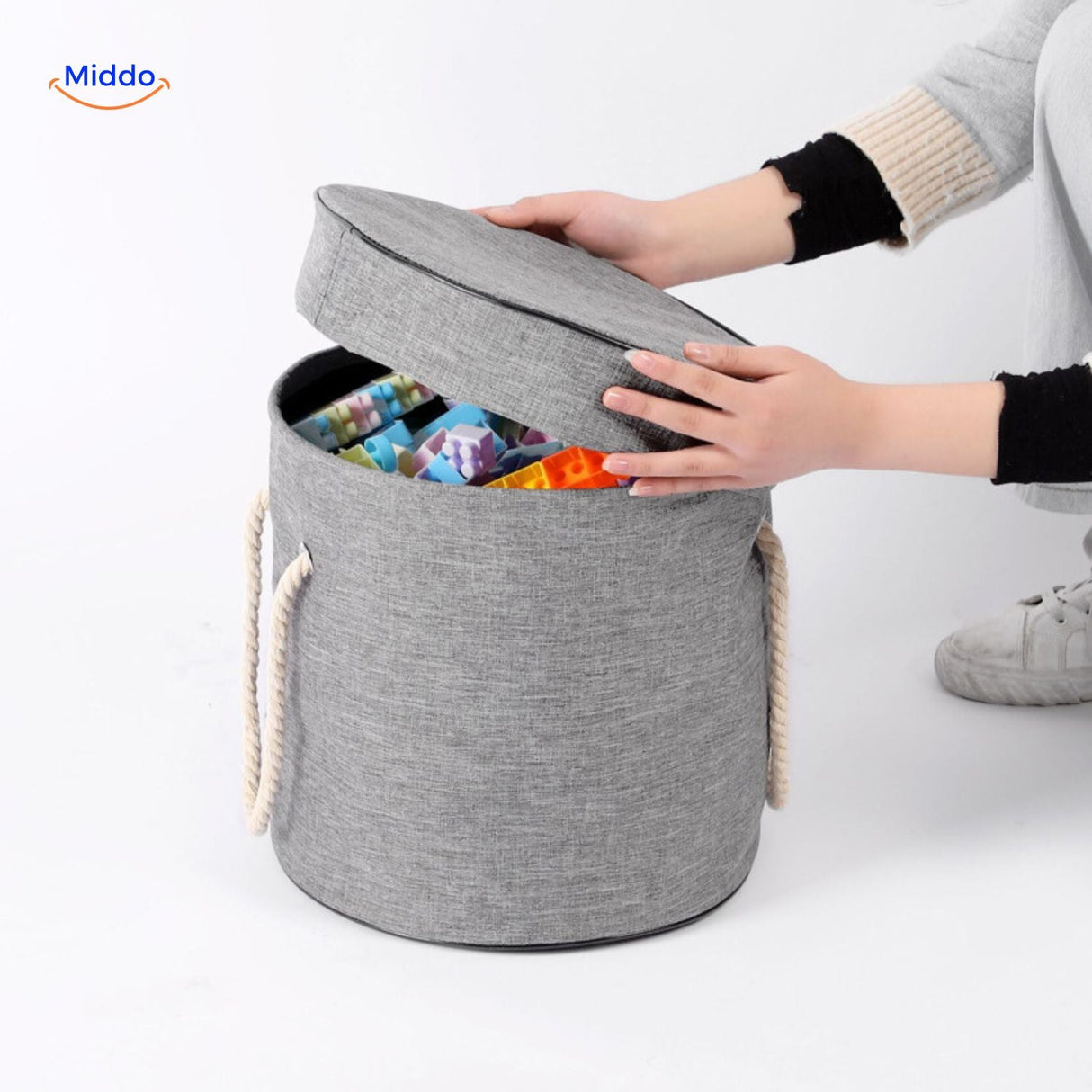 sac zippé rangement jouets avec motif smiley jaune souriant sur le tissu