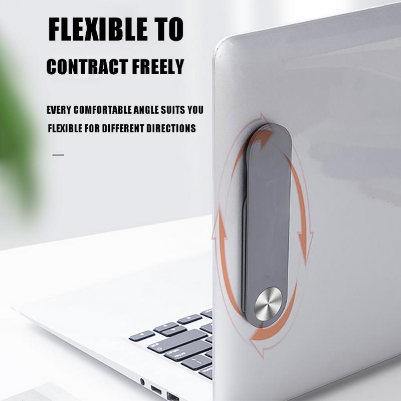 clip magnétique flexible attaché sur la tranche d'un ordinateur portable pour tenir le téléphone