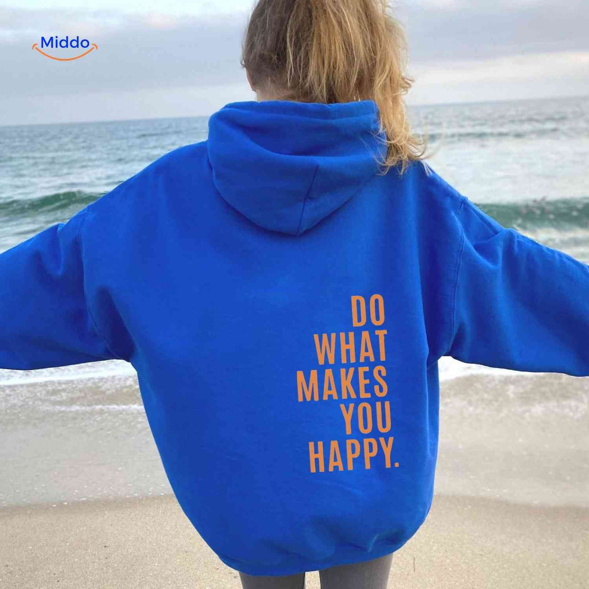 sweat à capuche oversize bleu avec inscription do what makes you happy en orange