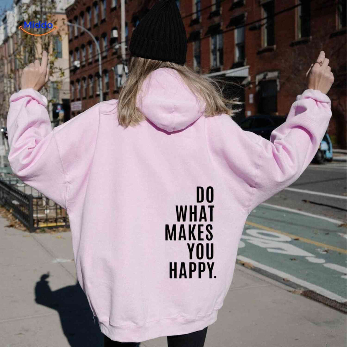 sweat à capuche oversize rose avec inscription do what makes you happy en noir