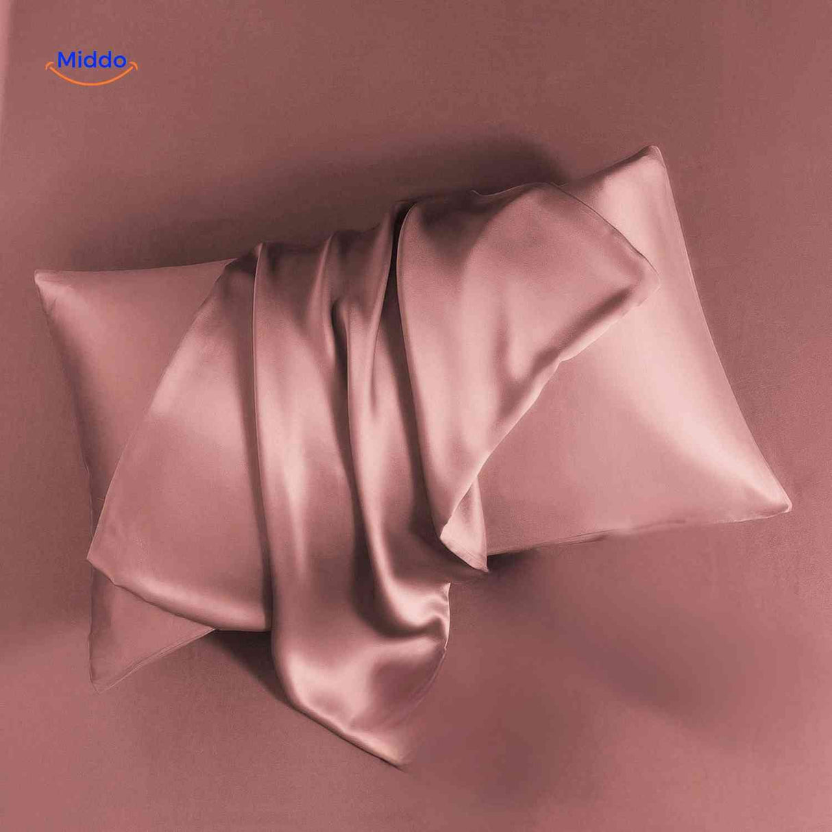 taie d'oreiller en satin rose, idéale pour préserver les cheveux la nuit