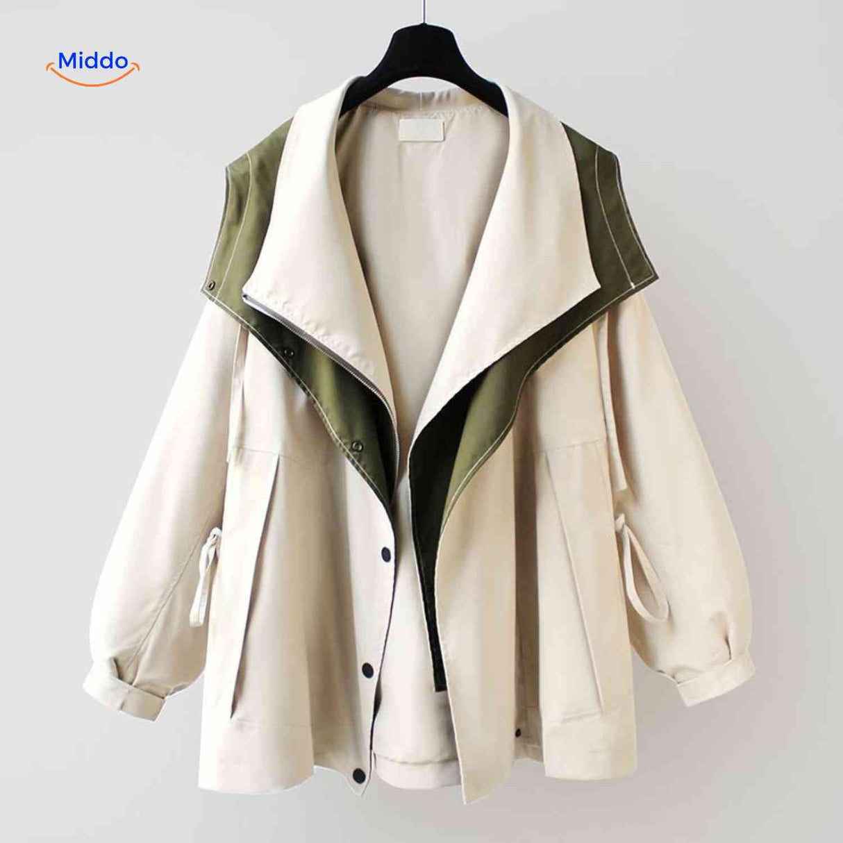 veste déperlante oversize crème avec détail vert, coupe moderne femme