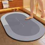 Aquastep Badmat ovaal licht grijze kleur www.middo.nl