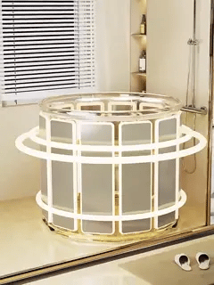 HydroFold baignoire transparente dorée dans une salle de bains