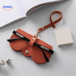 Productfoto van de oranje brillenhoes CompactVision