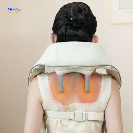appareil de massage coloris crème avec fonction chauffante pour soulager les tensions