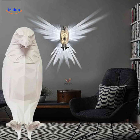 applique aigle blanc avec lumiere dans les ailes, parfaite pour eclairer un coin lecture avec style
