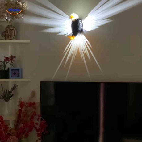 applique aigle led installee au-dessus de la tv dans un salon, eclairage decoratif elegant et tendance