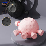 balle de massage mains en coloris noir et rose au design durable