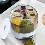 een foto van boven de graandispenser waar meerdere soorten bonen in zitten, gele, groene, rode en soja bonen.