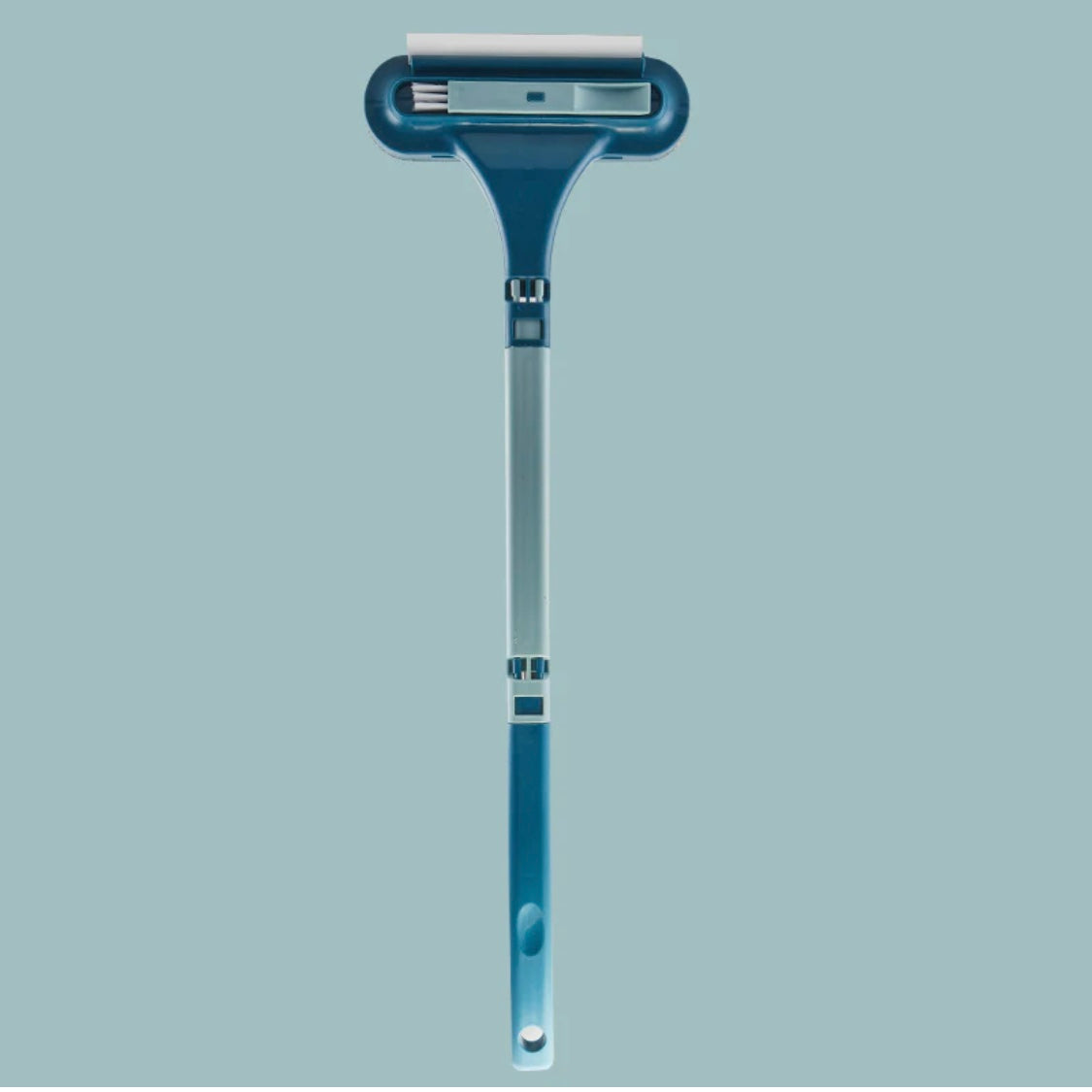 brosse anti-poils bleue avec long manche et bande en caoutchouc pour toutes surfaces