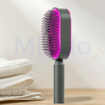 brosse à cheveux avec bouton nettoyant violette posée sur son support