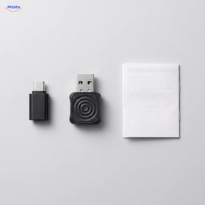 Contenu de la boîte : adaptateur, adaptateur USB-C et notice