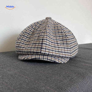 casquette plate bleu et marron motif pied-de-poule en laine