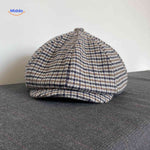 casquette plate bleu et marron motif pied-de-poule en laine