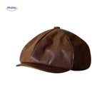 casquette plate en cuir brun foncé, coupe rétro style années 20