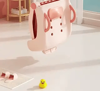 chaise de bain bébé repliée avec motif canard et poignées ergonomiques pour le transport