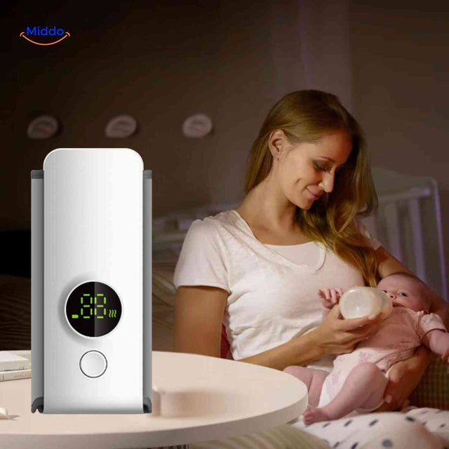 chauffe-biberon portable sans fil : mère qui nourrit son bébé la nuit grâce à la chaleur constante