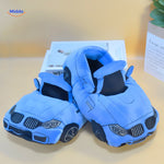 chaussons voiture bleu vus du dessus, design aérodynamique et semelle antidérapante