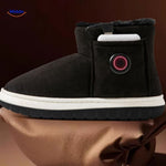modèle noir des chaussures chauffantes avec élément chauffant visible, technologie intégrée