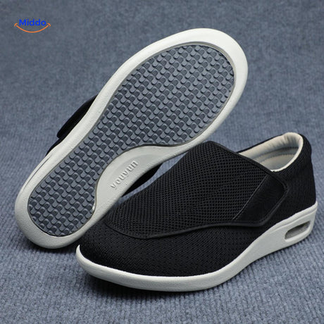 chaussures de confort noires avec fermeture velcro, design élégant et polyvalent