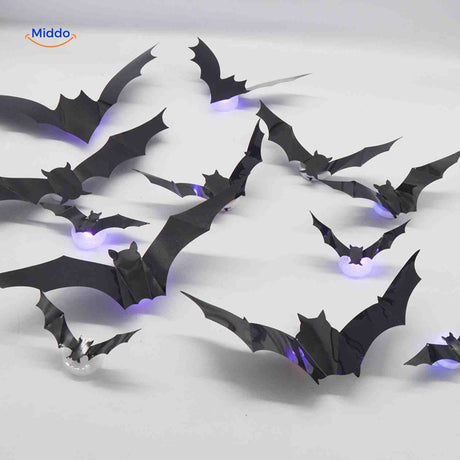 chauves-souris 3d avec lumière led posées sur table pour décoration halloween en intérieur