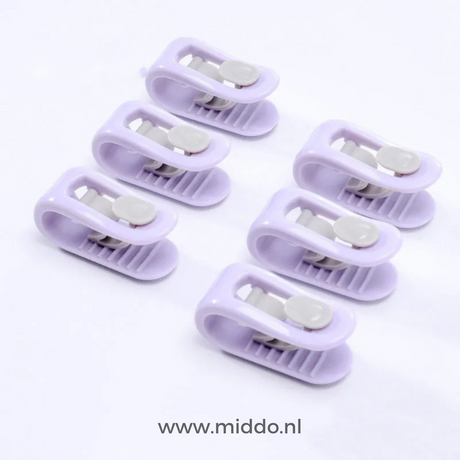 six clips anti-glissement pour couette coloris lilas sur fond blanc