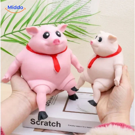 cochon squish rose avec cravate rouge, gros plan sur le design mignon et les détails