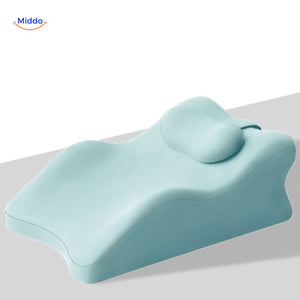coussin bleu avec appui-tête pour soutien postural et confort quotidien