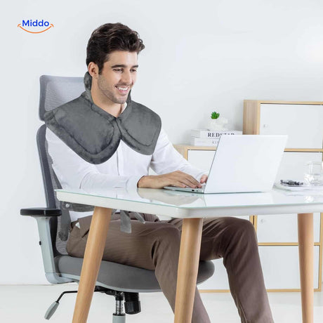coussin chauffant cou et épaules utilisé au bureau pour plus de confort pendant le travail