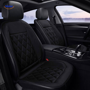 coussin chauffant siège auto monté dans l'habitacle d'une voiture au style sportif