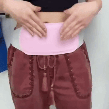 coussin chauffant huggy en action avec fonction massage therapie pour douleurs abdominales