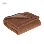 couverture velours protection animaux en coloris beige chaud pour un intérieur chaleureux