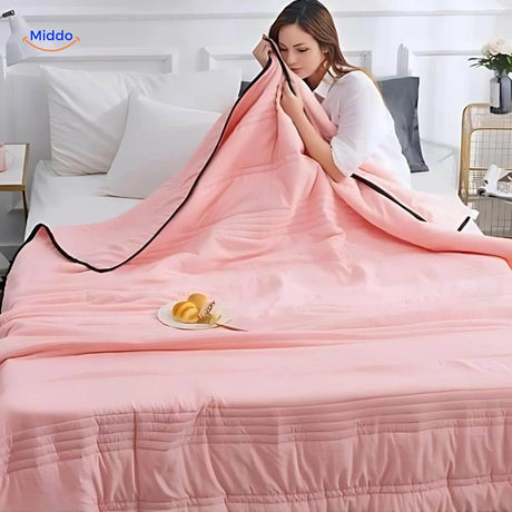 couverture rafraîchissante légère coloris rose clair, confort estival tout en douceur