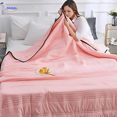 couverture rafraîchissante légère coloris rose clair, confort estival tout en douceur