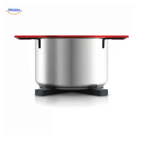 dessous de verre résistant à la chaleur sous une casserole en inox lors d'une utilisation en cuisine