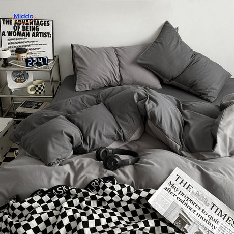ensemble de literie en coton bleu foncé et bleu clair pour un sommeil réparateur