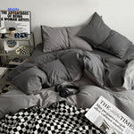 ensemble de literie en coton bleu foncé et bleu clair pour un sommeil réparateur