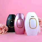 épilateur IPL disponible en trois coloris : noir, rose et blanc côte à côte