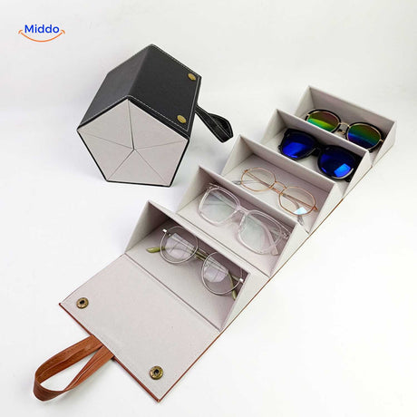 étui à lunettes pliable noir 6 compartiments avec plusieurs paires de lunettes en présentation