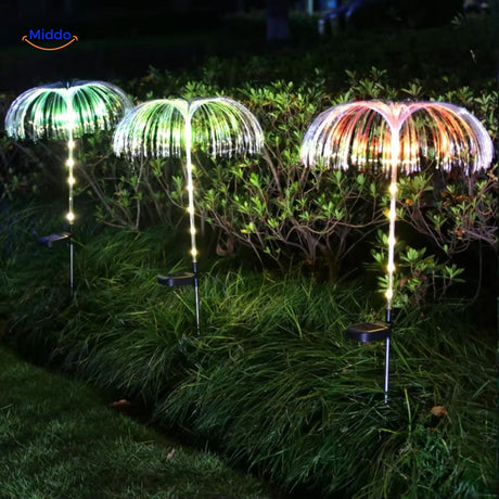 fontaine solaire fiber optic avec changement de couleur vert et rose dans le jardin